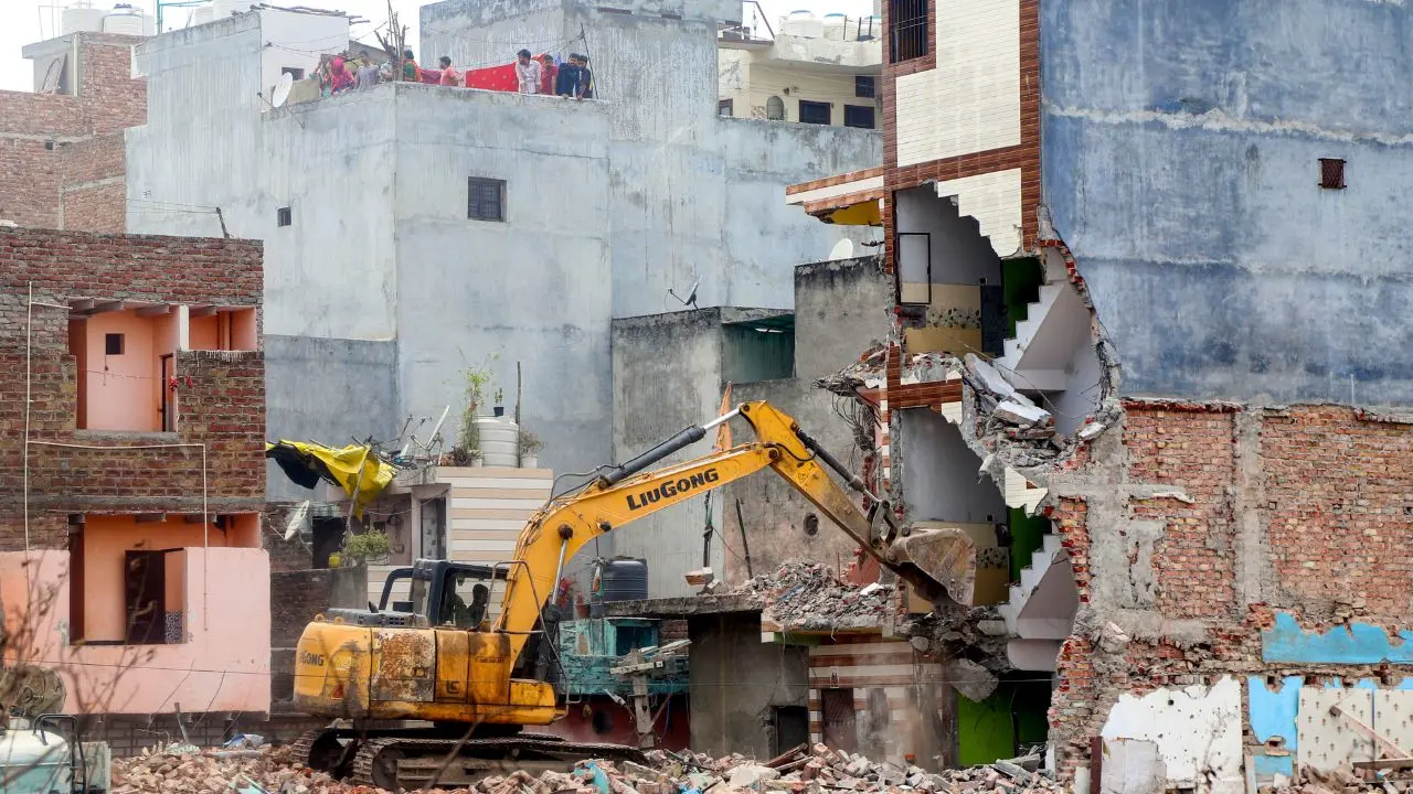 Delhi govt begins demolition of 143 illegal structures to widen road in Shalimar Bagh Authorities carry out a demolition drive to remove encroachments along a road, in Shalimar Bagh area. Pic/PTI